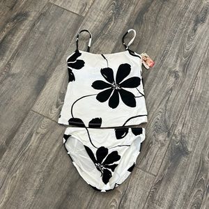 Very flattering black and white tankini swimsuit.